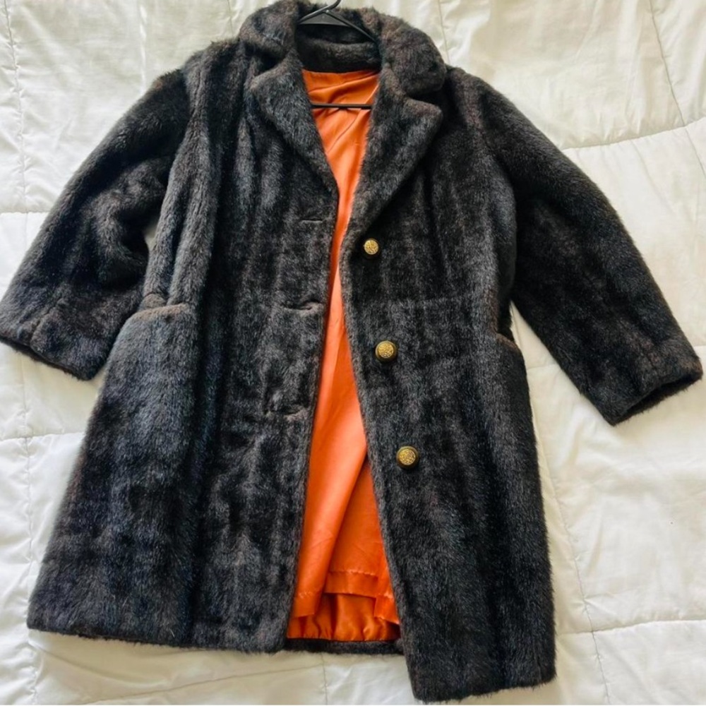 Dark Brown/Black vintage style faux fur coat with orange lining. Size Medium